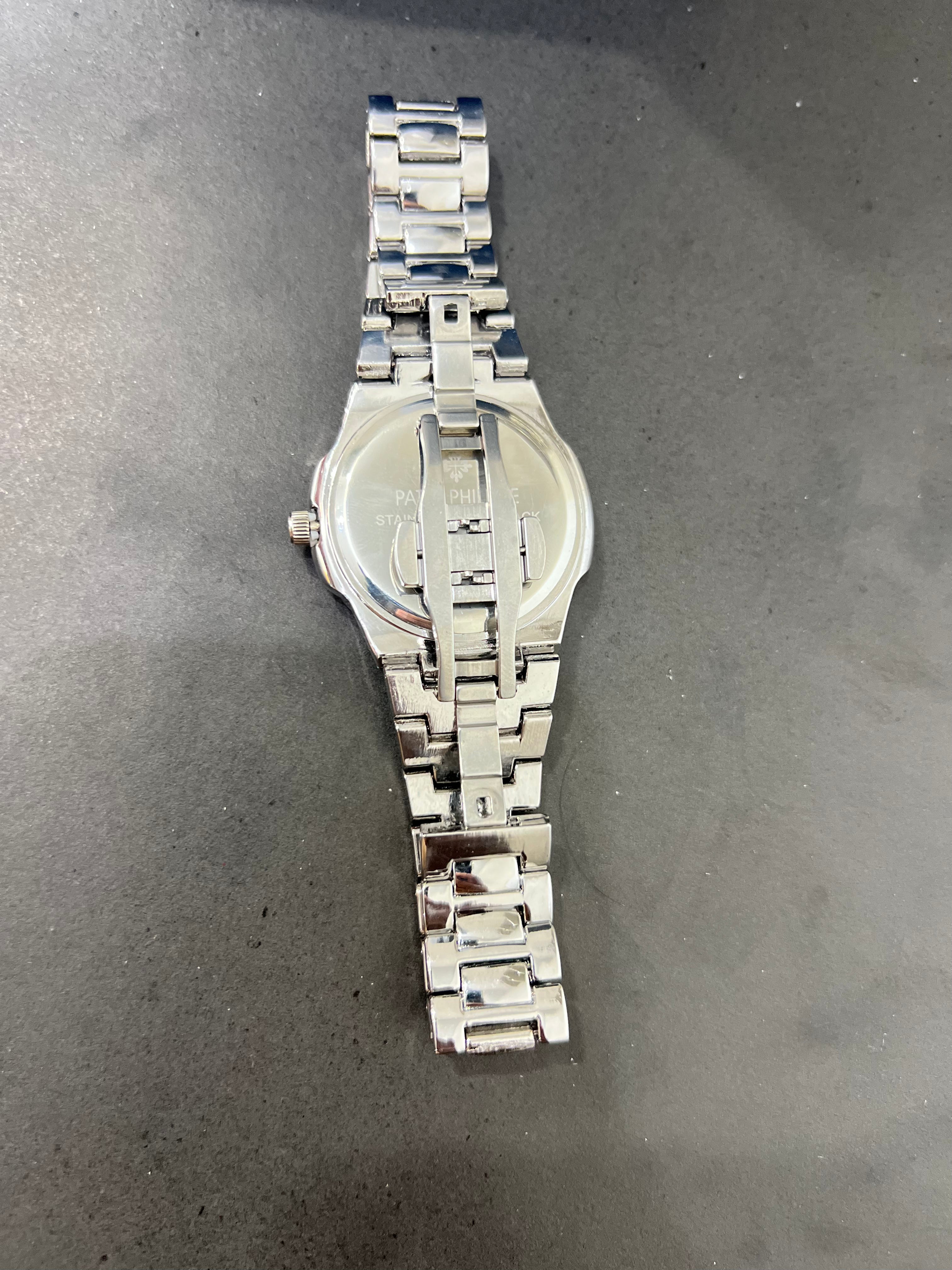 Patek Philippe White dial with date.