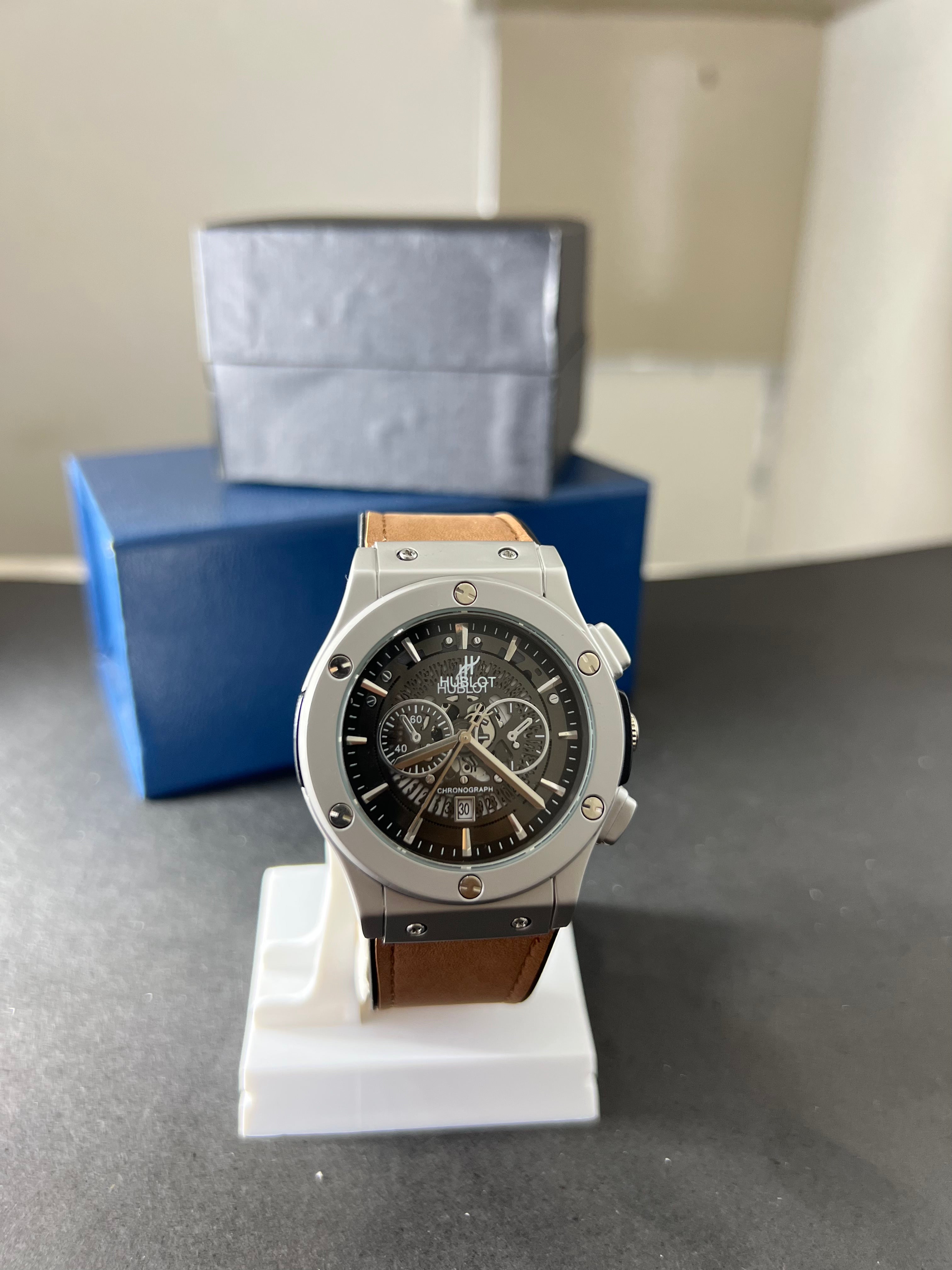 Hublot strap-watch with date and chronograph.