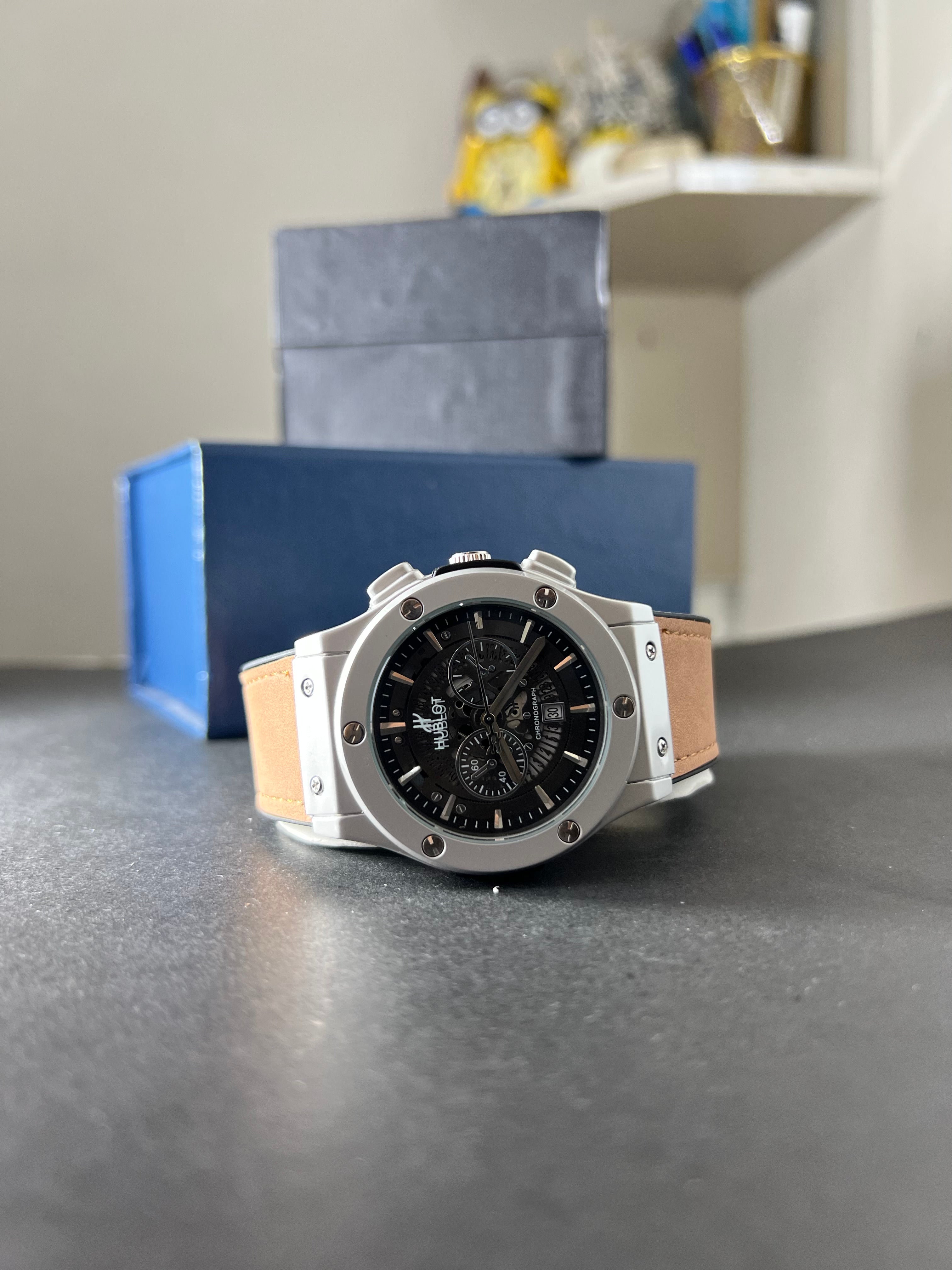 Hublot strap-watch with date and chronograph.